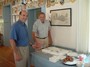 President Gary Jaquith and Past Ce3ntennial President Stanley Wilbur of Wallingford Rotary # 6483, District 7870 Prepare to serve the cake.